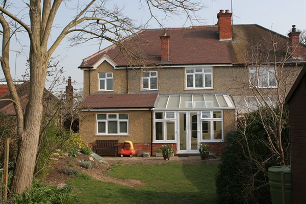 This is the rear of the property showing the finished extension with the new conservatory.