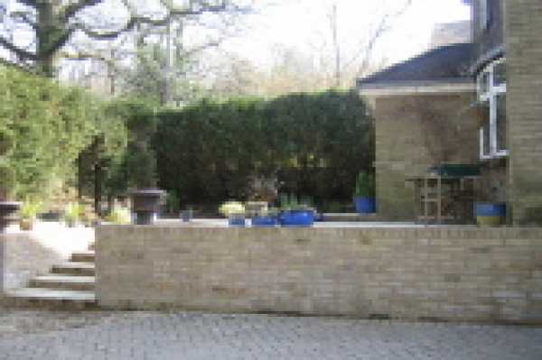 Decorative walling and patio in Burghfield - This walling and patio was built to make use of a space that was previously grassed and muddy.