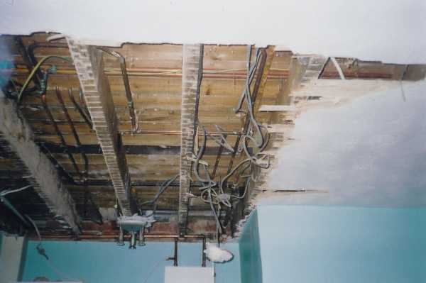 This shows the exiting kitchen ceiling being ripped down and all the electrics. These were all replaced and tidied up.
